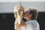Swedish tennis player Stefan Edberg kisses the Gentlemen's Singles- Old Photo