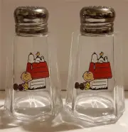 A Set of Charlie Brown Doghouse Salt & Pepper Shakers