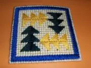 NEW completed plastic canvas mug mat arrows