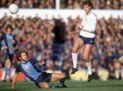 Glenn Hoddle of Tottenham Hotspur is challanged by Nick Holmes of - Old Photo