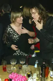 Edith Bowman and Singer Justin Hawkins from The Darkness attend t- 2004 Photo