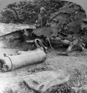 Shattered remains of a luckless howitzer blown up by a direct Germ- Old Photo