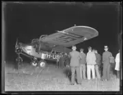 Crowd surrounding a plane for Charles Kingsford Smith's departure f- Old Photo