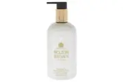 Mesmerising Oudh Accord and Gold Body Lotion by Molton Brown for Unisex - 10 oz Body Lotion