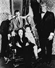 TED CASSIDY AS LURCH/THING, JACKIE COOGAN AS 8X10 PHOTO