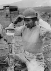 Greek labourer adjusting his steel helmet 1950s OLD PHOTO