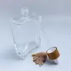 46x 100ml flat clear bottles with bemboo lids