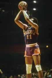 Clem Haskens Phoenix Suns shoots v the Capital Bullets at an NBA - 1974 Photo