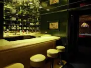 Bar near TV room monkey figure Graceland, mansion 13.8-acre estate Memphis,
