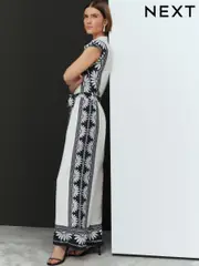 White/Black Placement Floral Short Sleeve Tie Waist Placket Detail Jumpsuit (AJ6330) | $98