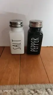 Brand New Black And White Salt And Pepper Shakers!