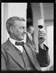 Colonel George Somerville holding up a glass of wine, NSW, 1930 Old Photo