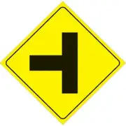 VOSS SIGNS YELLOW PLASTIC REFLECTIVE SIGN 12" - LEFT T-INTERSECTION 467 LT YR