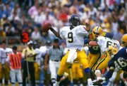 Major Harris West Virginia Mountaineers drops back to pass v- Football Photo 1