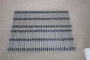 Twenty Four Pieces of O Scale Gauge, Black Ties, Tubular 10-inch Straight Track