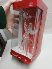 Vintage Holiday time Angel tree top Holding Star