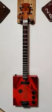 Sixty 4 string cigar box guitar.