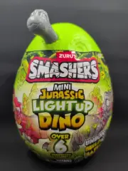 ZURU Smashers MINI JURASSIC LIGHT UP DINO Egg Surprises GREY BONE