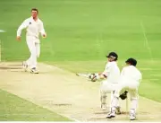 Australia v England at Brisbane Captain ALEC STEWART sweeps a- Old Cricket Photo