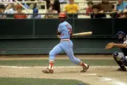Outfielder Lou Brock St. Louis Cardinals swings and watches the fl- Old Photo