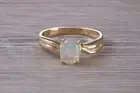 Natural Oval cut Opal set Yellow Gold Ring