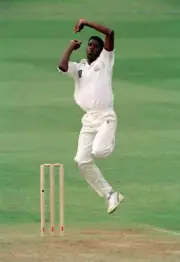 Joey Benjamin bowling for Surrey circa May 1994 Old Cricket Photo