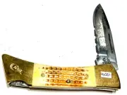 Case XX USA 59LL SS bone lockback serrated edge etched folding knife