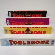 4 X 100g TOBLERONE SWISS Chocolate VARIETY PACK _ NUTS RAISINS HONEY WHITE DARK