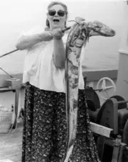 Hattie Jacques holds the conger eel she caught whilst fishing aboa- Old Photo