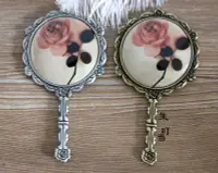 在飛比找樂天市場購物網優惠-韓國進口復古銅鏡子化妝鏡玫瑰手持鏡子便攜鏡直柄小鏡小巧