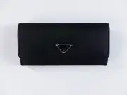 PRADA Re-Nylon solid black triangle logo nylon continental wallet authentic NWT