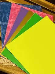 Lot: 8"x 11" scrapbook paper. New 50 Sheets Smooth, Textured, Shimmer, & Shiny!