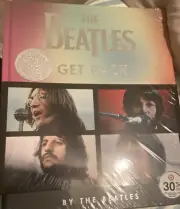 The Beatles Get Back Hardcover Book with Four Exclusive Lobby Cards Sealed.
