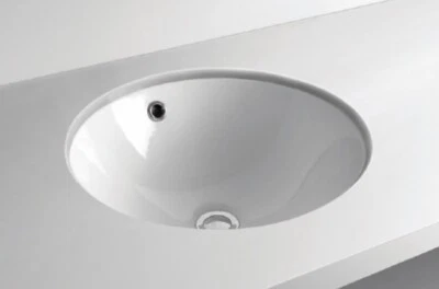White ceramic undermount sink, brand new in box, RRP $285. 2 available