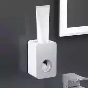 Automatic Toothpaste Dispenser Squeezer Toothbrush Holder BRAND NEW