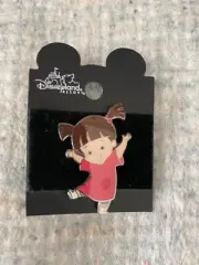 Disney's Pink Poo Pin from Monster Inc and 1965 Mickey Children's Book