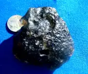 Libyan Desert Glass Meteorite Tektite impact specimen( 595 crt)Very Dark Gem +