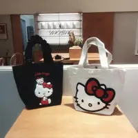 在飛比找ETMall東森購物網優惠-日本HelloKitty帆布包女手拎小包購物袋休閑可愛學生手