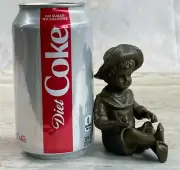 Vintage cast stone statue of a young boy Holding a Ball in His Hand Statue Decor