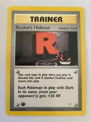 Rocket’s Hideout 63/64 1st Edition Pokemon Card Near Mint