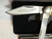 Schrade Walden jigged bone Anniversary Knife #297 in original tin, nos iob