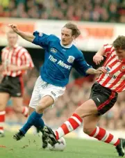 Simon Charlton of Southampton tackles Paul Walsh of Portsmouth dur- Old Photo