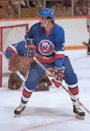 Stefan Persson of the New York Islanders watches the play- Ice Hockey Old Photo
