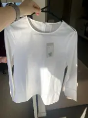cos women's white top with tags $115, size 34 stunning design with zip back