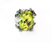 Luxury women's sterling silver oval ring with flower accent unique style.