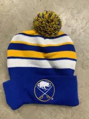 Blue Light Buffalo Sabers Sonic Blue, White, Yellow Bering Pom Cuffed Knit Hat