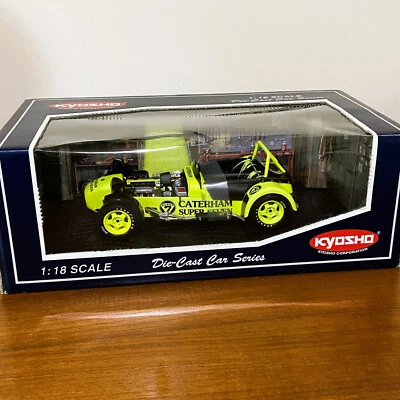 NOS Kyosho 1:18 Diecast Car, Caterham Super Seven JPE, Yellow, Clam Shell, 7022Y