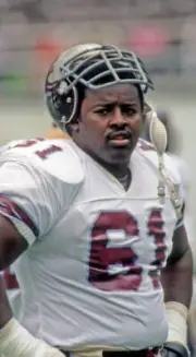 Offensive lineman Tyrone McGriff of the Michigan Panthers looks - 1983 Old Photo