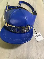 AW20 Moschino Couture Jeremy Scott LEATHER HAT SHAPED FANNY PACK BLUE GOLD LOGO.
