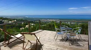 Lounge des hauts 3 maisons a L'etang-Sale sans vis a vis avec vue panoramique Ocean et Montagne